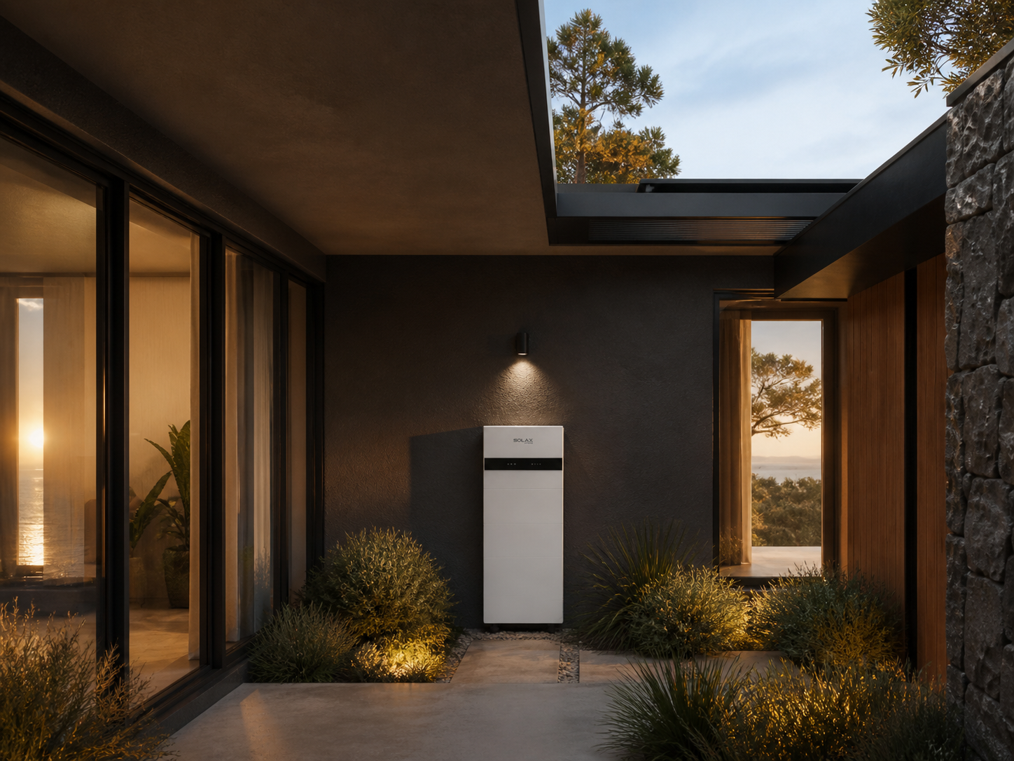 SolaX hybrid inverter installed on the exterior wall of a coastal home at sunset